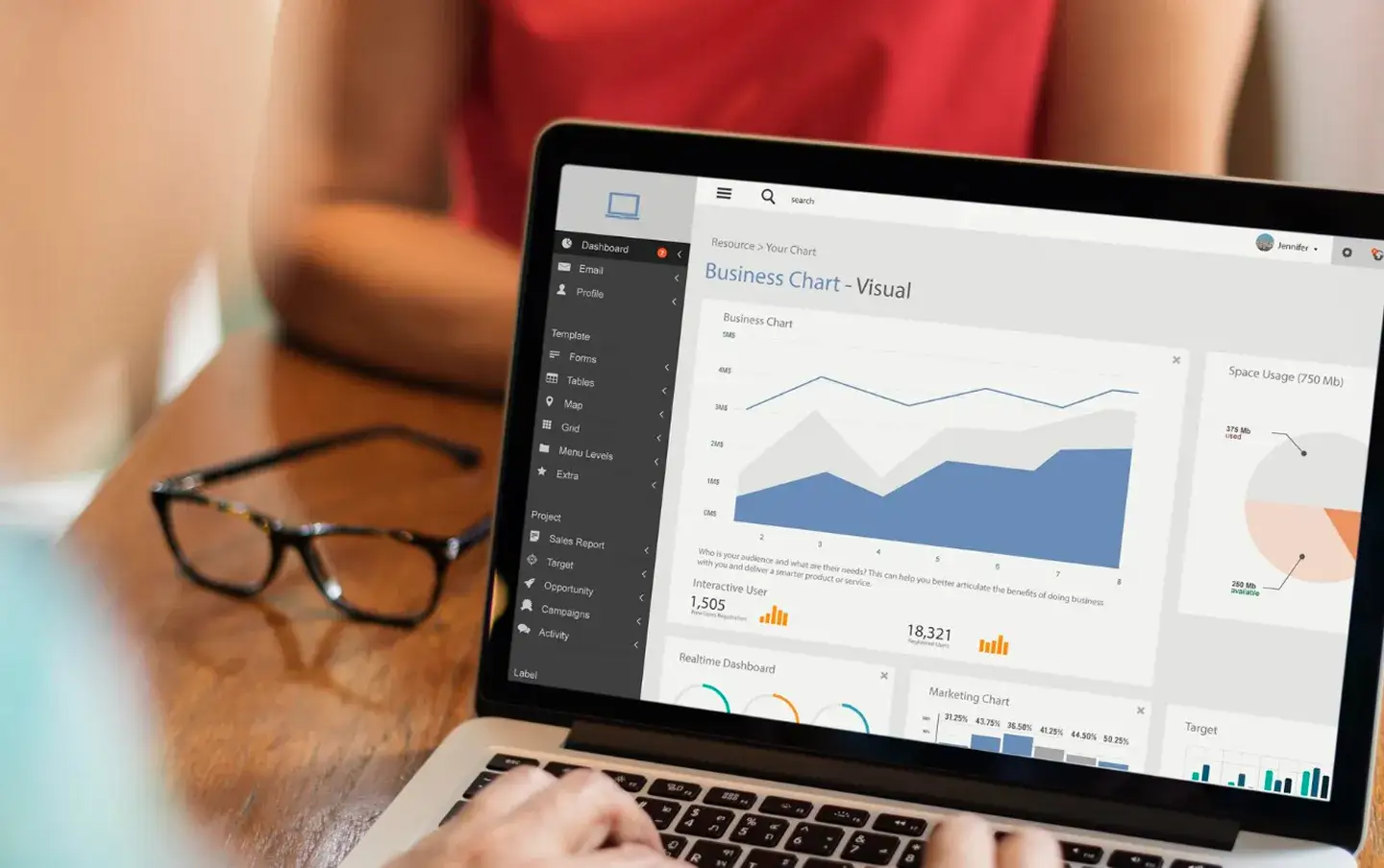 Laptop displaying rising website traffic analytics, illustrating the results of professional SEO services for organic growth.